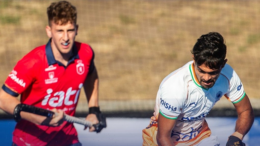 TheHockeyIndia/X : Indian Hockey Team players in action against Spain in FIH Pro League 2025-26 Australia leg match. 