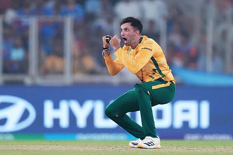 South Africa's Keshav Maharaj reacts after taking the wicket of India's Hardik Pandya during the T20 World Cup cricket match between India and South Africa in Ahmedabad, India.