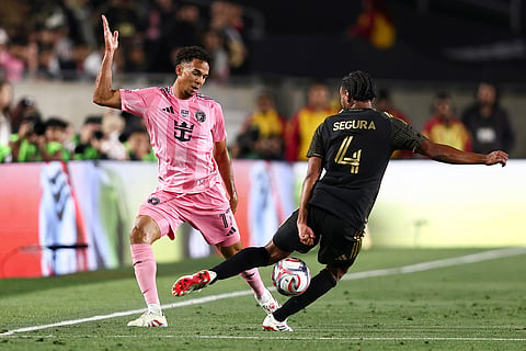 Inter Miami defender Ian Fray (17) battles for the ball against Los Angeles FC defender Eddie Segura (4) during the first half of an MLS soccer match in Los Angeles, Calif.