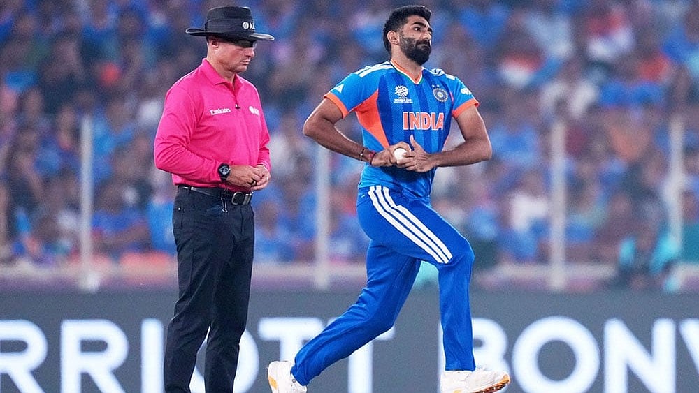Photo: AP/Ajit Solanki : India's Jasprit Bumrah bowls a delivery during the T20 World Cup cricket match between India and South Africa in Ahmedabad, India.