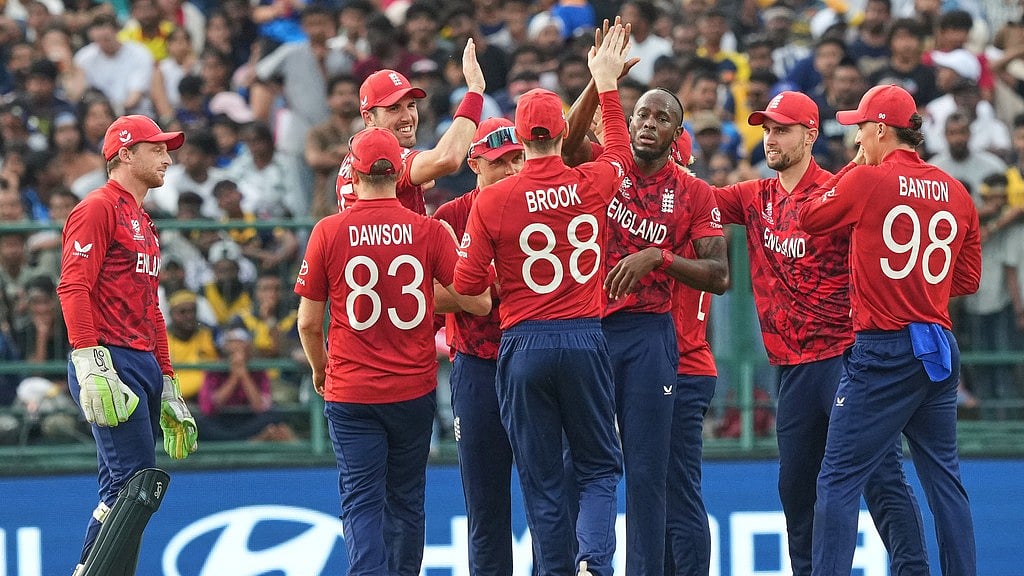 AP Photo/Eranga Jayawardena : England's Jofra Archer, center without cap, celebrates with teammates the wicket of Sri Lanka's Kamil Mishara during the T20 World Cup cricket match between Sri Lanka and England in Pallekele, Sri Lanka, Sunday, Feb. 22, 2026. 