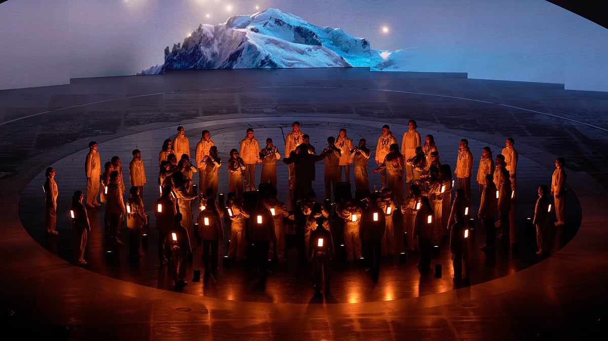 (AP Photo/Bernat Armangue) : Artists perform during the closing ceremony of the 2026 Winter Olympics, in Verona, Italy, Sunday, Feb. 22, 2026. 