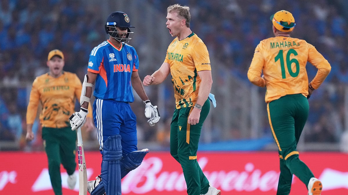 (AP Photo/Ajit Solanki) : South Africa's Corbin Bosch, second right, celebrates with teammates the wicket of India's Washington Sundar, second left, during the T20 World Cup cricket match between India and South Africa in Ahmedabad, India, Sunday, Feb. 22, 2026