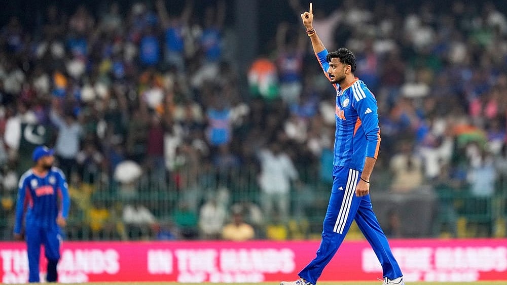 | Photo: AP/Eranga Jayawardena : India's Axar Patel celebrates the wicket of Pakistan's Usman Khan during the T20 World Cup cricket match between India and Pakistan in Colombo, Sri Lanka.
