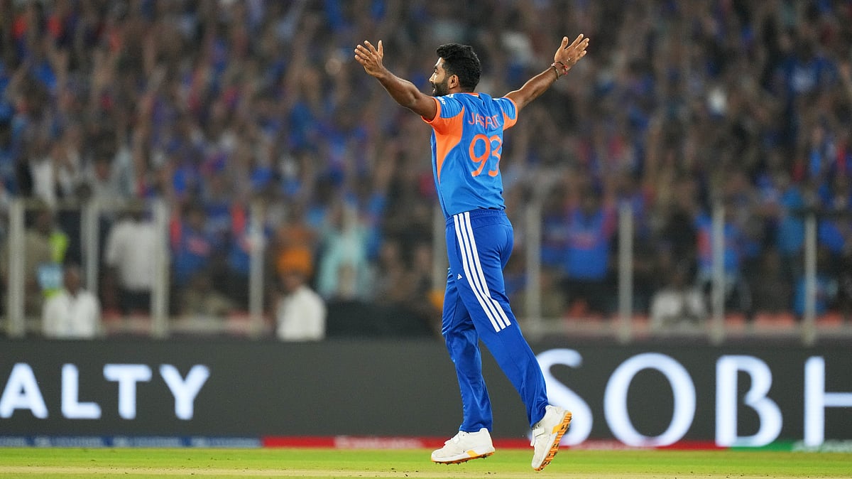 (AP Photo/Ajit Solanki) : India's Jasprit Bumrah celebrates the wicket of South Africa's Quinton de Kock during the T20 World Cup cricket match between India and South Africa in Ahmedabad, India, Sunday, Feb. 22, 2026