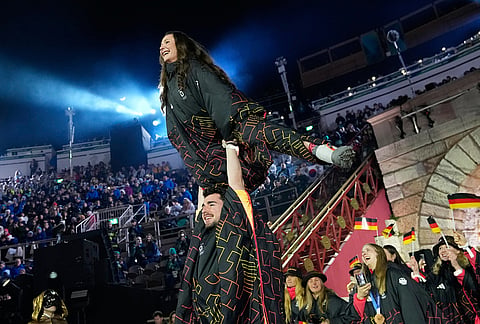 Athletes from Germany attend the closing ceremony of the 2026 Winter Olympics, in Verona, Italy.