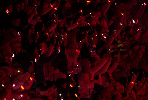 Athletes attend the closing ceremony of the 2026 Winter Olympics, in Verona, Italy.