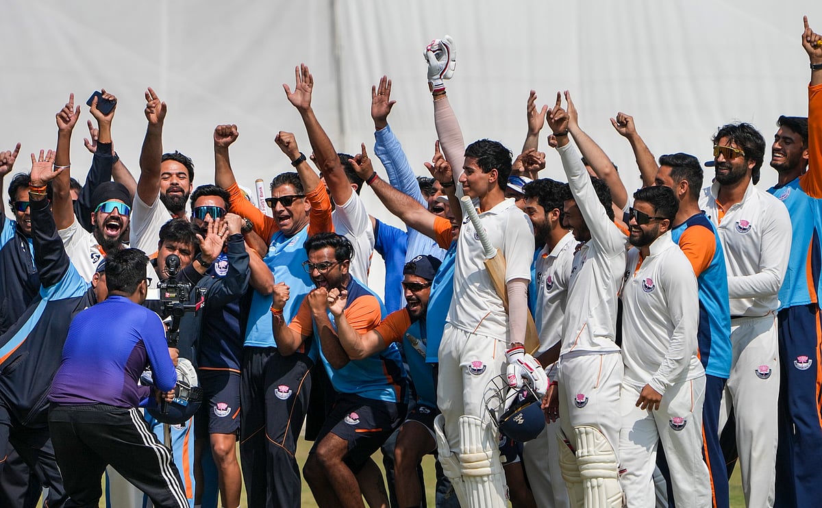 PTI : Jammu and Kashmir's Vanshaj Sharma with teammates , seen celebrating after the team's victory in the Ranji Trophy semifinal cricket match against Bengal, at the Bengal Cricket Academy Ground, in Kalyani, West Bengal, Wednesday, Feb. 18, 2026. 