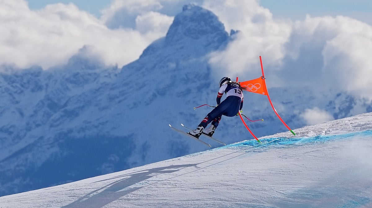 | Photo: AP/Jacquelyn Martin : United States' Lindsey Vonn crashes into a gate during an alpine ski women's downhill race, at the 2026 Winter Olympics, in Cortina d'Ampezzo, Italy, Feb. 8, 2026. 