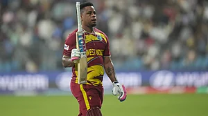 | Photo: AP/Rafiq Maqbool : West Indies' Shimron Hetmyer leaves the ground after losing his wicket during the T20 World Cup cricket match between Zimbabwe and West Indies in Mumbai, India, Monday, Feb. 23, 2026.