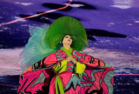 An artist performs during the closing ceremony of the 2026 Winter Olympics, in Verona, Italy.