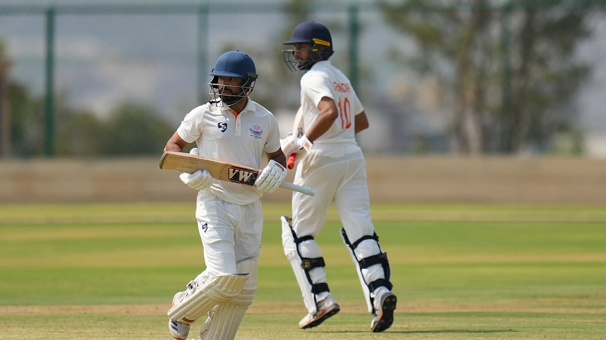 PTI Photo : Jammu and Kashmir batters in action on Day 1 of Ranji Trophy 2025-26 final against Karnataka.