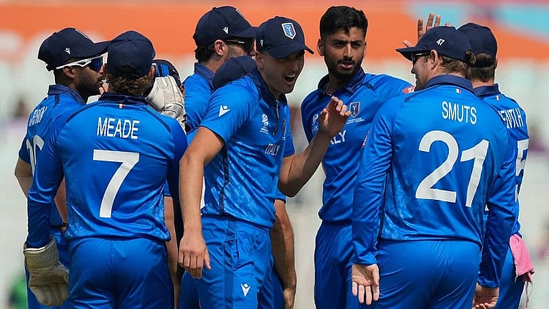 File/AP : Italy players celebrate the wicket of West Indies' Brandon King during a T20 World Cup match in Kolkata.