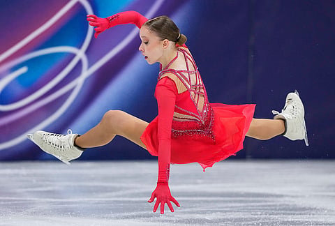 Mariia Seniuk of Israel falls during the women's figure skating free program at the 2026 Winter Olympics, in Milan, Italy, Thursday, Feb. 19, 2026. 