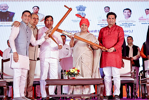 Delhi Chief Minister Rekha Gupta, second right, during a ceremony to lay foundation stones for development projects in the Mundka Assembly constituency, in New Delhi. 