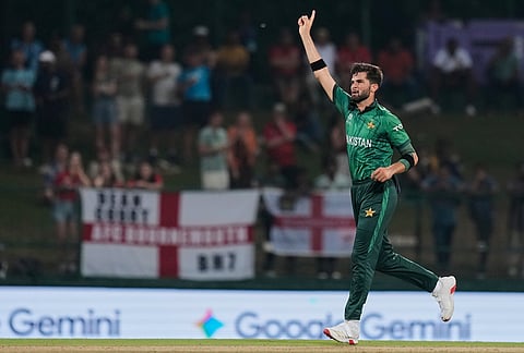 Pakistan's Shaheen Shah Afridi celebrates the wicket of England's Jos Buttler during the T20 World Cup cricket match between England and Pakistan in Pallekele, Sri Lanka.