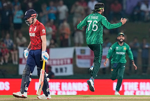 Pakistan's Usman Tariq, centre, celebrates the wicket of England's Tom Banton during the T20 World Cup cricket match between England and Pakistan in Pallekele, Sri Lanka.