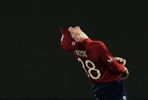 England's captain Harry Brook reacts after dropping a catch during the T20 World Cup cricket match between England and Pakistan in Pallekele, Sri Lanka.