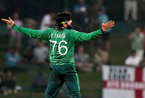 Pakistan's Usman Tariq celebrates the wicket of England's Sam Curran during the T20 World Cup cricket match between England and Pakistan in Pallekele, Sri Lanka.