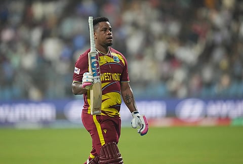 West Indies' Shimron Hetmyer leaves the ground after losing his wicket during the T20 World Cup cricket match between Zimbabwe and West Indies in Mumbai.
