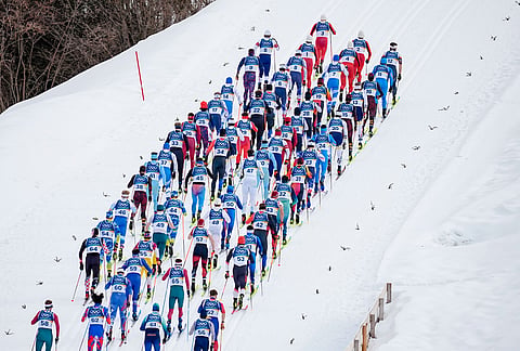 Athletes compete in the cross country skiing men's 50km mass start Classic at the 2026 Winter Olympics, in Tesero, Italy, Saturday, Feb. 21, 2026. 
