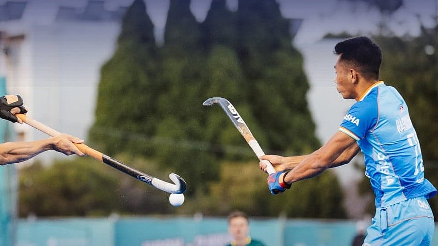 TheHockeyIndia/X : Indian hockey players in action against Australia in FIH Pro League 2025-26 at Hobart.