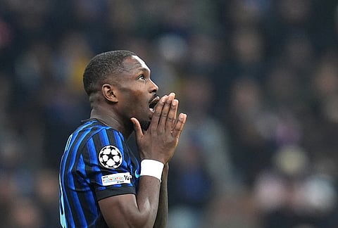 Inter Milan's Marcus Thuram reacts during the Champions League soccer match between Inter Milan and Bodø/Glimt in Milan, Italy.