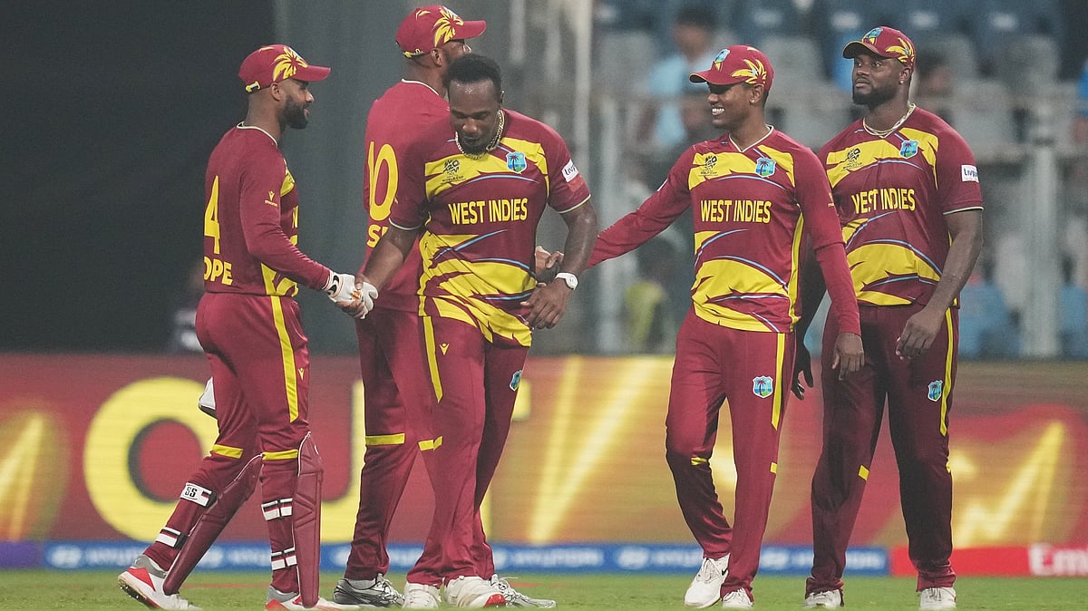 | Photo: AP/Rafiq Maqbool : West Indies players celebrates after their win against Zimbabwe during the T20 World Cup cricket match in Mumbai, India, Monday, Feb. 23, 2026. 
