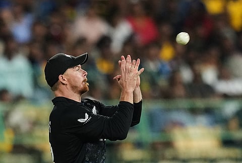 New Zealand's Glenn Phillips takes the catch to get Sri Lanka's Kamindu Mendis during the T20 World Cup cricket match between Sri Lanka and New Zealand in Colombo, Sri Lanka.