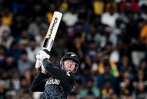 New Zealand's captain Mitchel Santner plays a shot during the T20 World Cup cricket match between Sri Lanka and New Zealand in Colombo, Sri Lanka.