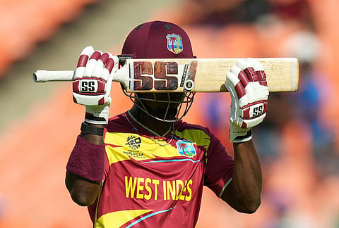 West Indies' Sherfane Rutherford reacts as he leaves the ground after losing his wicket during the T20 World Cup cricket match between South Africa and West Indies in Ahmedabad.