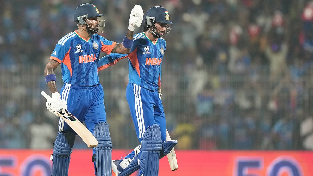 (AP Photo/Mahesh Kumar A.) : India's Hardik Pandya, left, celebrates his fifty runs during the T20 World Cup cricket match between India and Zimbabwe in Chennai, India, Thursday, Feb. 26, 2026