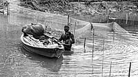 Photo: IMAGO / Depositphotos : Fisherman looking for fish in the river or lake, Begusarai, Bihar