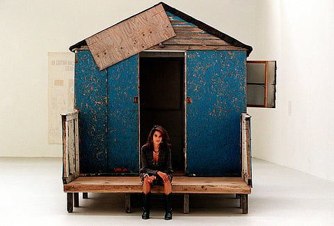 Tracey Emin with her installation, part of  "The Last Thing I said to you is don't leave me here II" part of the Ant Noises exhibition at Saatchi Gallery  (12/9/00)
