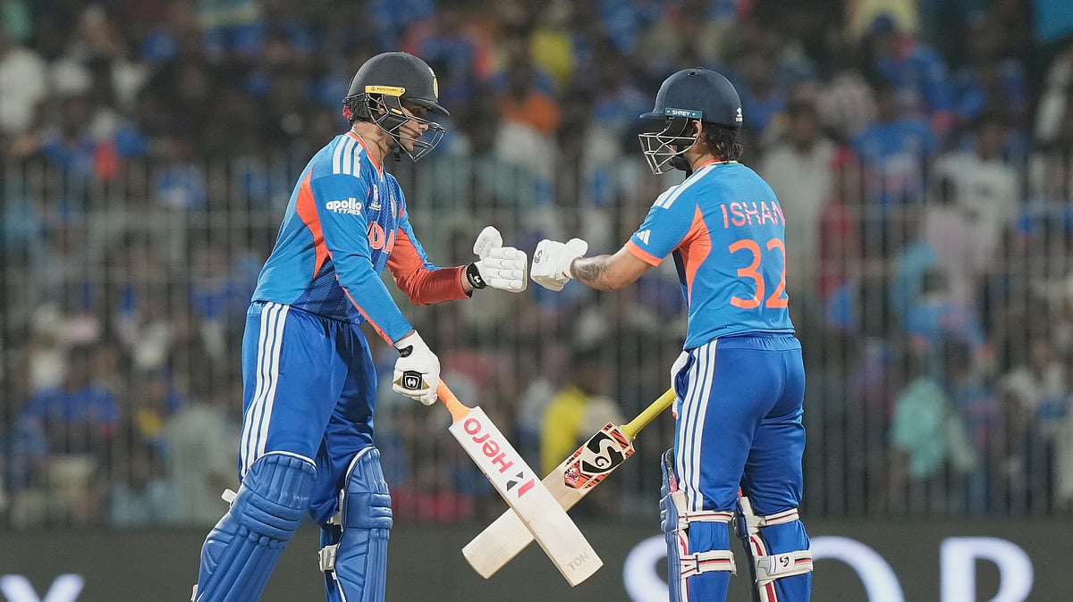 (AP Photo/Mahesh Kumar A.) : India's Abhishek Sharma, left, fist bumps his batting partner Ishan Kishan during the T20 World Cup cricket match between India and Zimbabwe in Chennai, India, Thursday, Feb. 26, 2026.