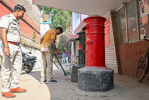 Krishnanagar: Security personnel conduct inspection at the Krishnanagar Head Post Office after it received a bomb threat, in Krishnanagar, West Bengal.