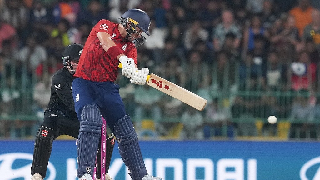 AP Photo/Eranga Jayawardena : England's Sam Curran plays a shot during the T20 World Cup cricket match between England and New Zealand in Colombo, Sri Lanka, Friday, Feb. 27, 2026.