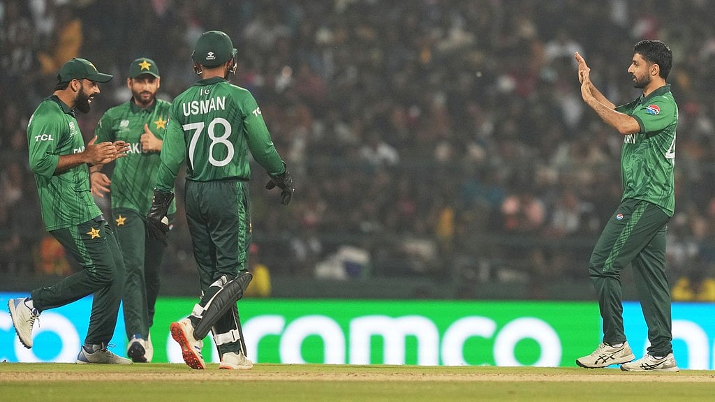 Photo: AP : Pakistan's Abrar Ahmed, right, celebrates with teammates the wicket of Sri Lanka's Kamil Mishara during the T20 World Cup match between Pakistan and Sri Lanka in Pallekele.