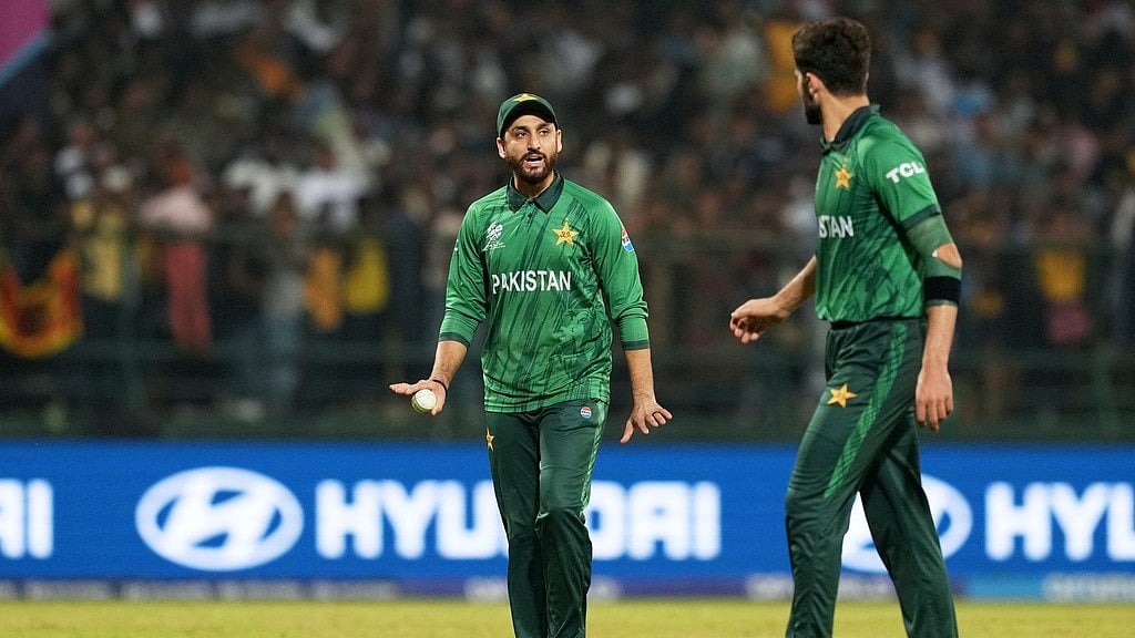 AP : Pakistan's captain Salman Ali Agha, left, has a word with teammate Shaheen Shah Afridi during the T20 World Cup match against Sri Lanka in Pallekele.