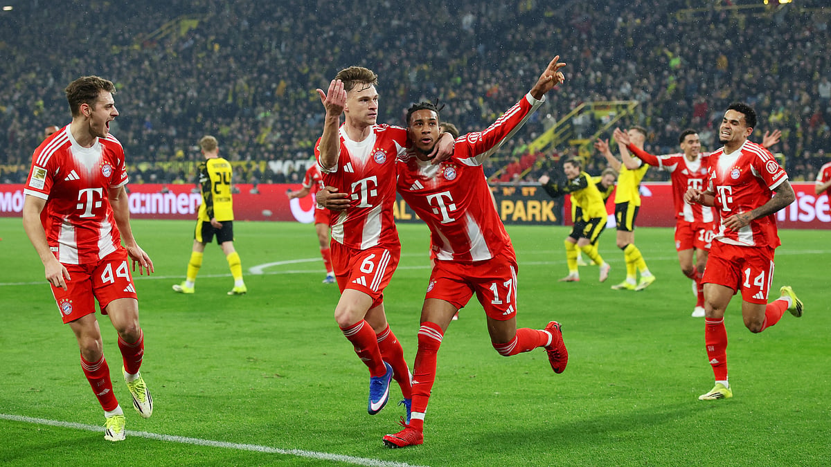 Bayern Munich's Joshua Kimmich celebrates his goal against Borussia Dortmund