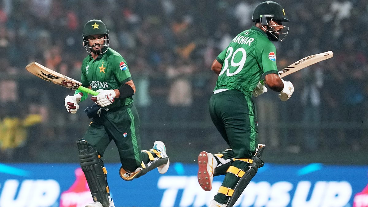 (AP Photo/Eranga Jayawardena) : Pakistan's Sahibzada Farhan, left, and batting partner Fakhar Zaman run between the wickets during the T20 World Cup cricket match between Pakistan and Sri Lanka in Pallekele, Sri Lanka, Saturday, Feb. 28, 2026