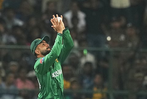 Pakistan's Mohammad Nawaz takes the catch to dismiss Sri Lanka's Pathum Nissanka during the T20 World Cup cricket match between Pakistan and Sri Lanka in Pallekele, Sri Lanka.