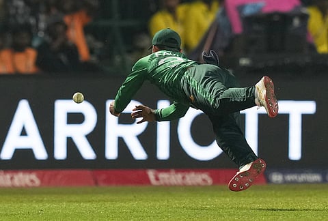 Pakistan's Fakhar Zaman fails to catch a shot from Sri Lanka's Pavan Rathnayake during the T20 World Cup cricket match between Pakistan and Sri Lanka in Pallekele, Sri Lanka.