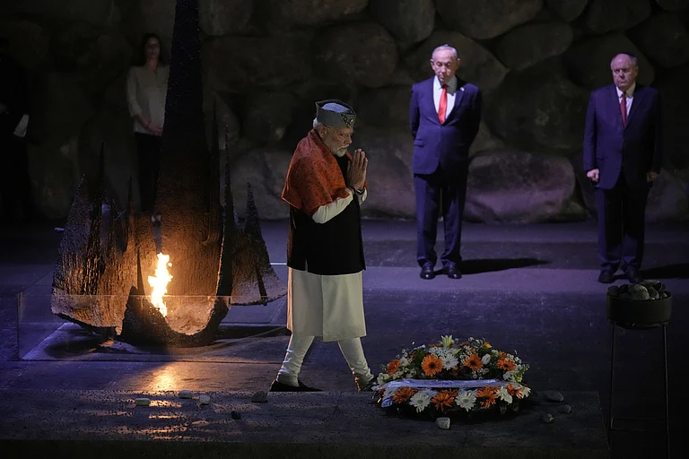 India's Prime Minister Narendra Modi lays a wreath and a rock at the Hall of Remembrance during his visit to the Yad Vashem Holocaust Memorial Museum in Jerusalem, Thursday, Feb. 26, 2026. - Leo Correa