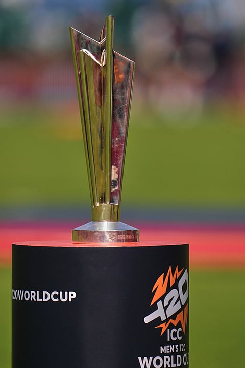 T20 World Cup trophy is being displayed before the start of the cricket match between South Africa and Zimbabwe in New Delhi.