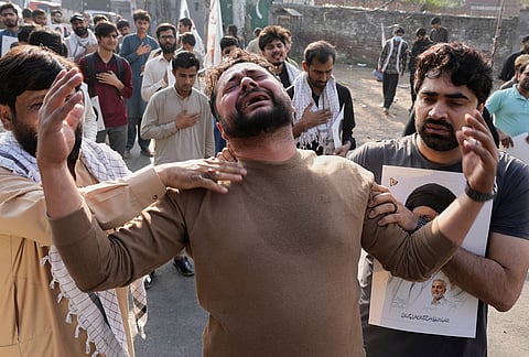 Shiite Muslims mourn the death of Iranian Supreme Leader Ayatollah Ali Khamenei during a protest against the U.S. and Israel in Lahore, Pakistan.