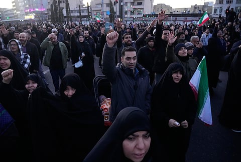 Government supporters chant slogans as they gather in mourning after state TV officially announced the death of Iranian Supreme Leader Ayatollah Ali Khamenei, in Tehran, Iran.