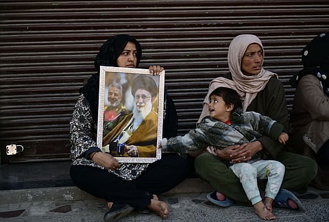 People take part in a protest against the alleged killing of Iranian Supreme Leader Ayatollah Ali Khamenei in a reported US-Israel strike, in Srinagar.