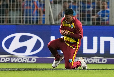 West Indies' Shimron Hetmyer takes the catch to dismiss India's Abhishek Sharma during the T20 World Cup cricket match between India and West Indies in Kolkata.
