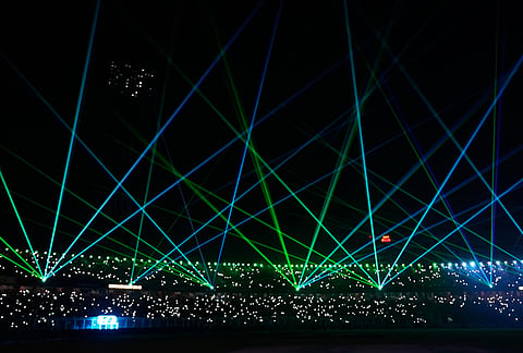 A laser show entertains the spectators during a drinks break of the T20 World Cup cricket match between India and West Indies in Kolkata.